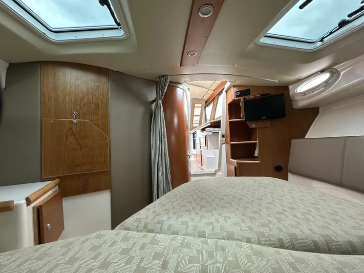  Yacht Photos Pics Interior of 2025 Cutwater C-32 CB boat, featuring cozy cabin and modern amenities.
