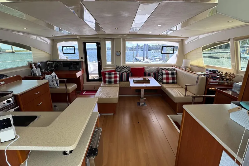  Yacht Photos Pics Luxurious interior of a 2014 Leopard 48 yacht with modern furnishings and scenic views.