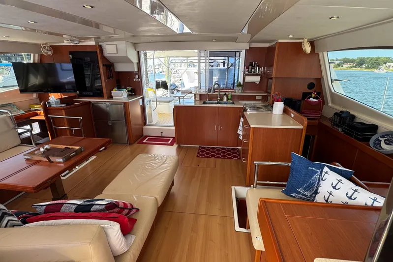  Yacht Photos Pics Luxurious interior of a 2014 Leopard 48 yacht with modern amenities and scenic views.