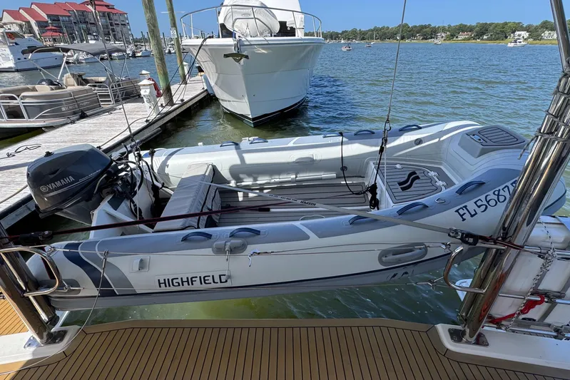  Yacht Photos Pics Highfield inflatable boat with Yamaha motor docked beside Leopard 48 yacht, 2014 model.