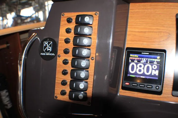 Knot Working Yacht Photos Pics Control panel of 2020 Ranger Tugs R-27 with switches and Garmin display.