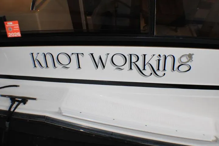 Knot Working Yacht Photos Pics 2020 Ranger Tugs R-27 boat with "Knot Working" name on the side.