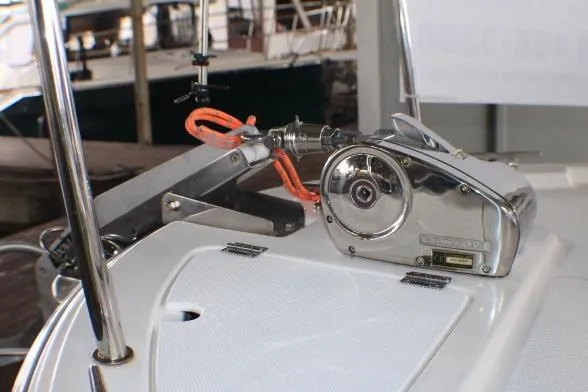 Knot Working Yacht Photos Pics 2020 Ranger Tugs R-27 boat anchor winch system on deck, featuring stainless steel components.