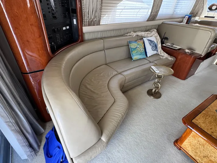 Aqueous Ubiquitous Yacht Photos Pics Luxurious interior of a 2004 Sea Ray 560 Sedan Bridge yacht with leather seating.