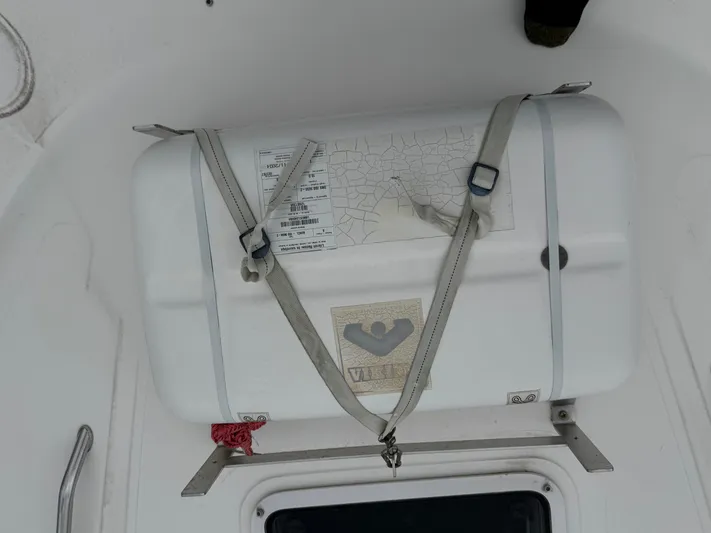 Aqueous Ubiquitous Yacht Photos Pics Life raft secured on 2004 Sea Ray 560 Sedan Bridge yacht.