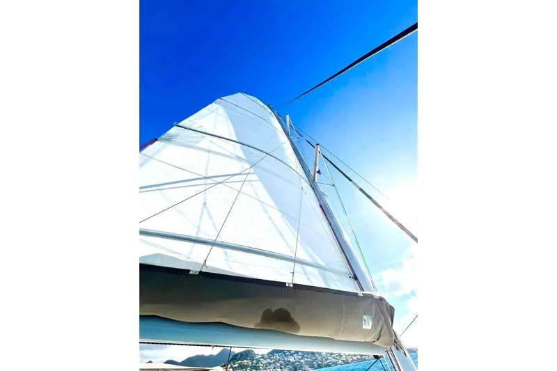  Yacht Photos Pics Sailing yacht Lagoon 400, 2012 model, with white sails against a clear blue sky.