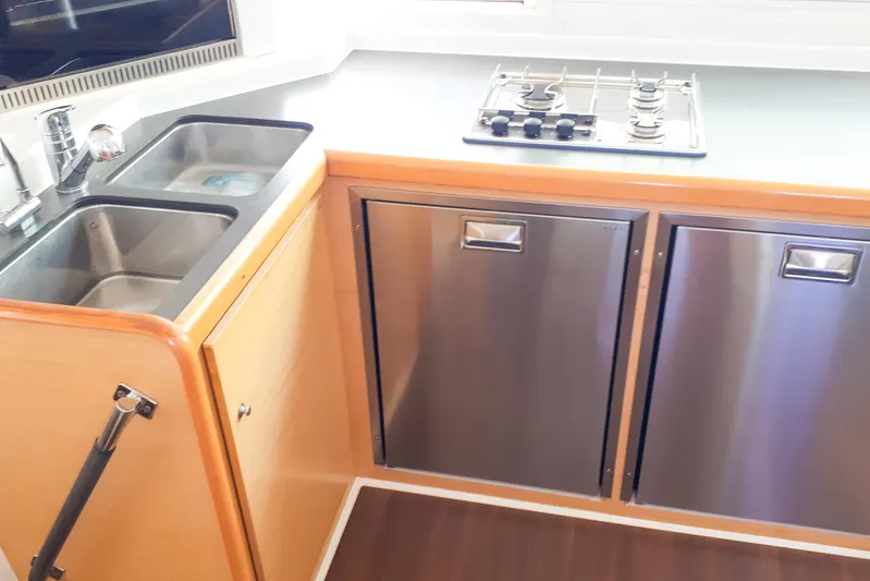  Yacht Photos Pics Modern kitchen in 2012 Lagoon 400 yacht with stainless steel appliances and dual sink.