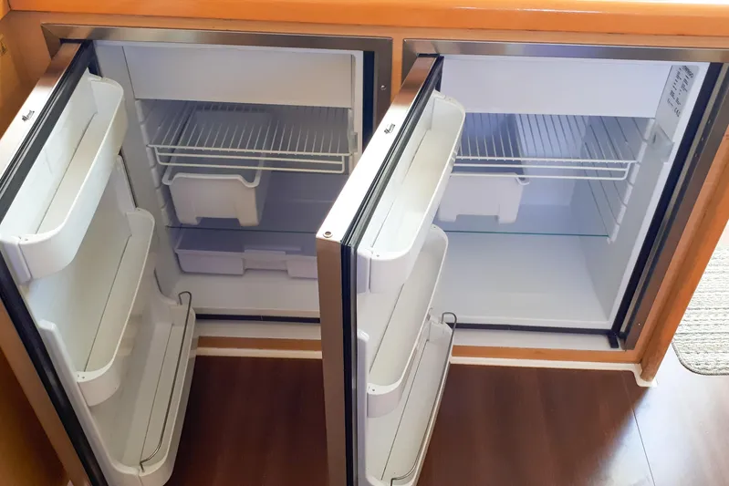  Yacht Photos Pics Open double-door refrigerator in 2012 Lagoon 400 yacht interior.