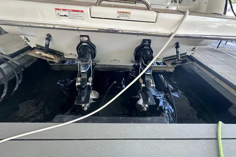  Yacht Photos Pics 2018 Formula 370 Super Sport boat stern with dual outboard motors in dock.