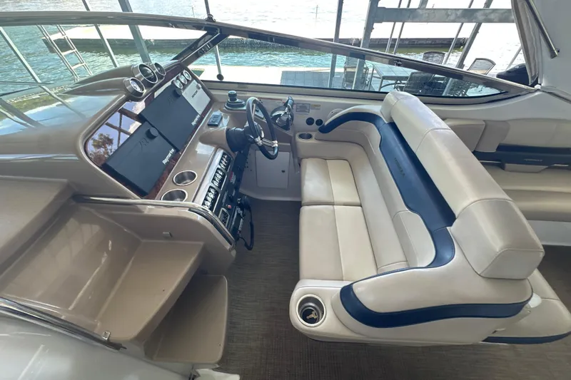  Yacht Photos Pics 2018 Formula 370 Super Sport boat interior with helm, seating, and dashboard view.
