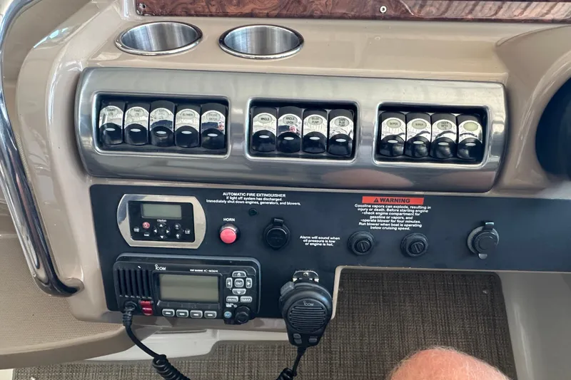  Yacht Photos Pics Control panel of a 2018 Formula 370 Super Sport boat with switches and radio.