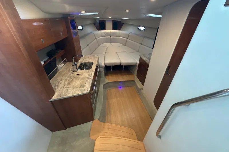  Yacht Photos Pics Interior of 2018 Formula 370 Super Sport yacht with modern kitchen and seating area.