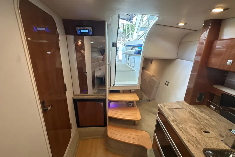  Yacht Photos Pics Interior of 2018 Formula 370 Super Sport yacht with wooden steps and modern amenities.