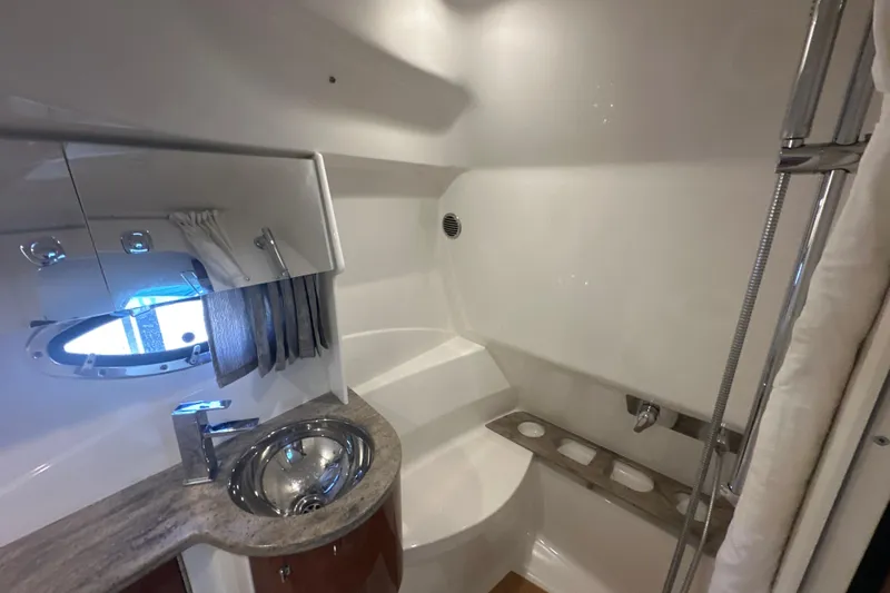  Yacht Photos Pics 2018 Formula 370 Super Sport bathroom with modern sink and shower.