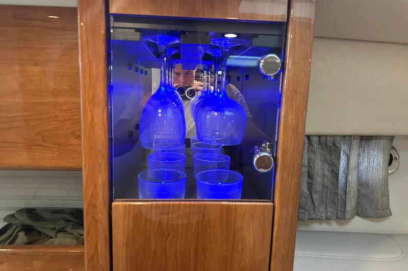  Yacht Photos Pics Illuminated glass cabinet in 2018 Formula 370 Super Sport boat interior.