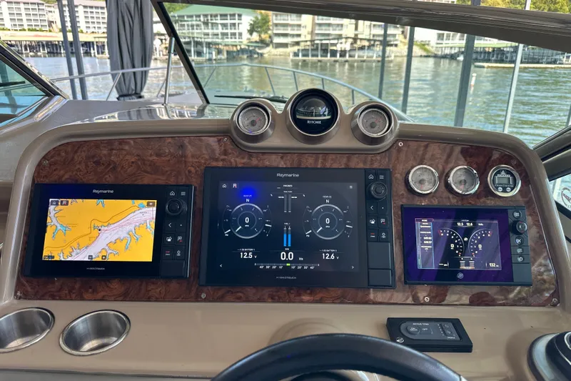  Yacht Photos Pics Dashboard of a 2018 Formula 370 Super Sport boat with navigation screens.