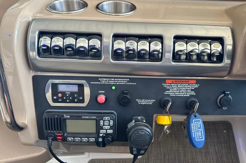  Yacht Photos Pics Control panel of a 2018 Formula 370 Super Sport boat with switches and radio.