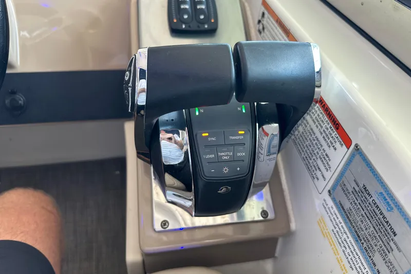  Yacht Photos Pics Throttle controls of a 2018 Formula 370 Super Sport boat cockpit.