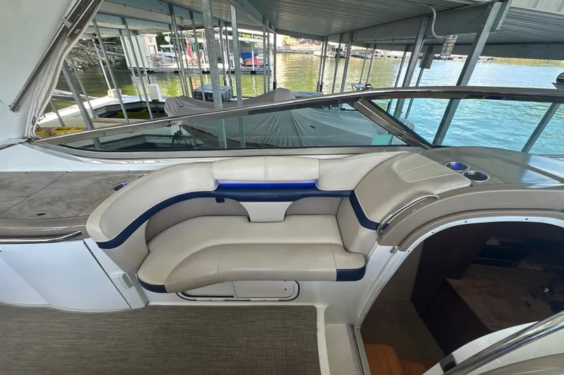  Yacht Photos Pics 2018 Formula 370 Super Sport boat interior with cushioned seating and cup holders.