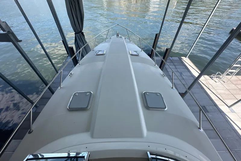  Yacht Photos Pics 2018 Formula 370 Super Sport boat docked, top view showing deck and water surroundings.