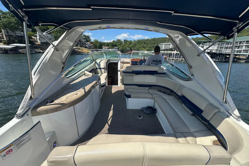  Yacht Photos Pics 2018 Formula 370 Super Sport boat interior with seating, canopy, and scenic water view.