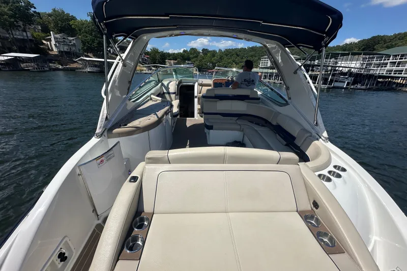  Yacht Photos Pics 2018 Formula 370 Super Sport boat interior with seating, canopy, and water view.