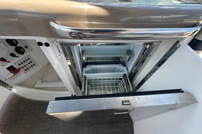  Yacht Photos Pics Open refrigerator in 2018 Formula 370 Super Sport boat interior.