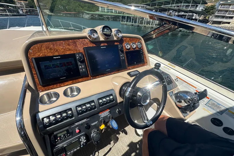 Yacht Photos Pics Dashboard of a 2018 Formula 370 Super Sport boat with navigation controls.