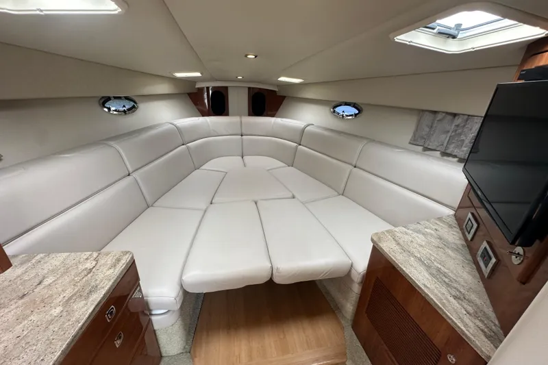  Yacht Photos Pics Interior of 2018 Formula 370 Super Sport boat with white leather seating and modern amenities.