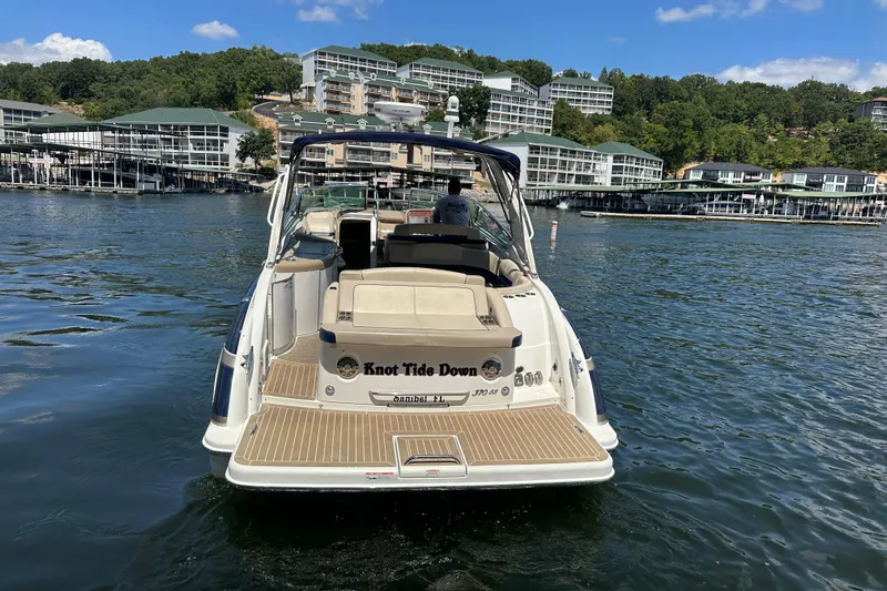  Yacht Photos Pics 2018 Formula 370 Super Sport boat on a lake with scenic background.