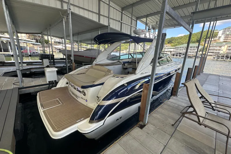  Yacht Photos Pics 2018 Formula 370 Super Sport boat docked in a covered marina.