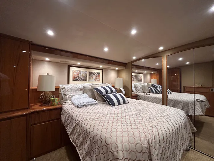 Reel Blessed Yacht Photos Pics Luxurious bedroom on a 2014 Viking ENC FB yacht.