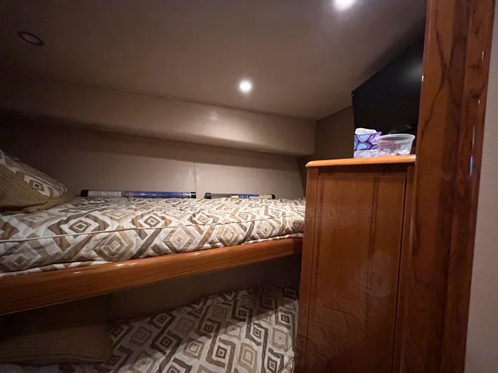 Reel Blessed Yacht Photos Pics Interior of a 2014 Viking ENC FB yacht with bunk bed.