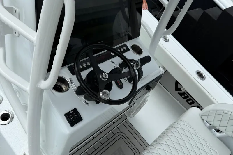  Yacht Photos Pics 2019 Barker Boatworks 26 Open helm with steering wheel and controls.