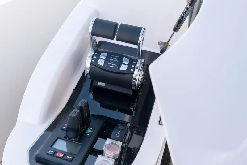  Yacht Photos Pics Control panel of 2019 Princess S78 yacht with throttle and navigation controls.