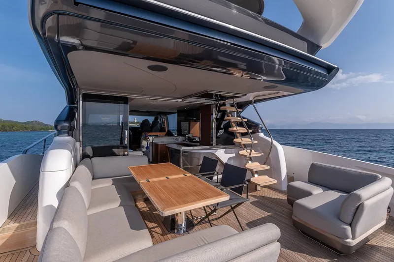  Yacht Photos Pics Luxurious 2019 Princess S78 yacht deck with elegant seating and ocean view.