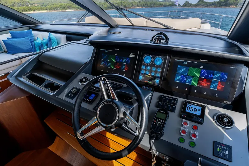  Yacht Photos Pics Luxurious 2019 Princess S78 yacht helm with advanced navigation displays and controls.