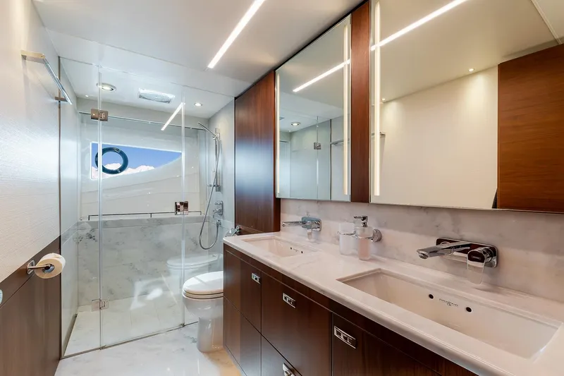  Yacht Photos Pics Luxurious bathroom in 2019 Princess S78 yacht with modern fixtures and glass shower.