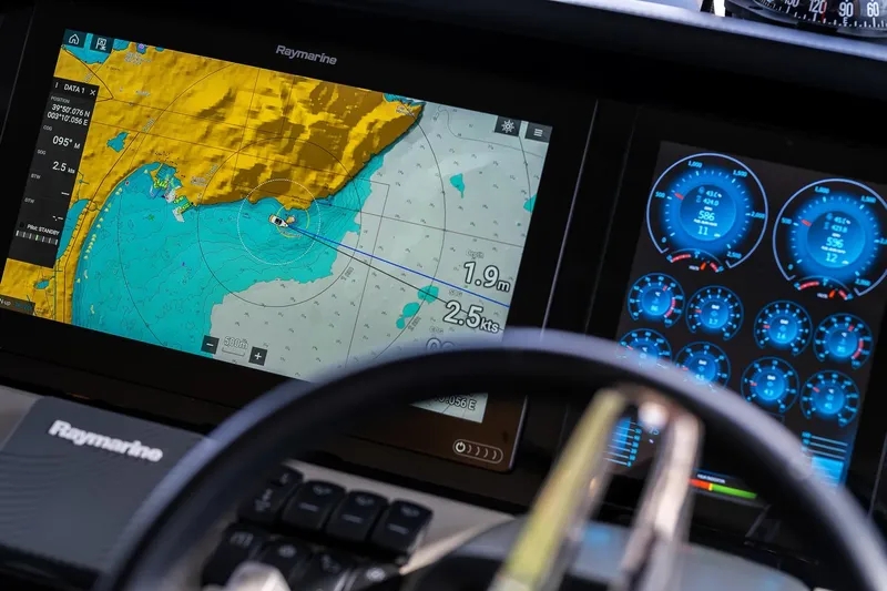  Yacht Photos Pics Navigation display on 2019 Princess S78 yacht, showing map and instrument gauges.