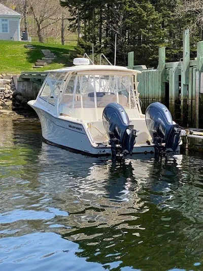  Yacht Photos Pics 2022 Grady-White 335 Freedom boat docked with twin outboard motors.