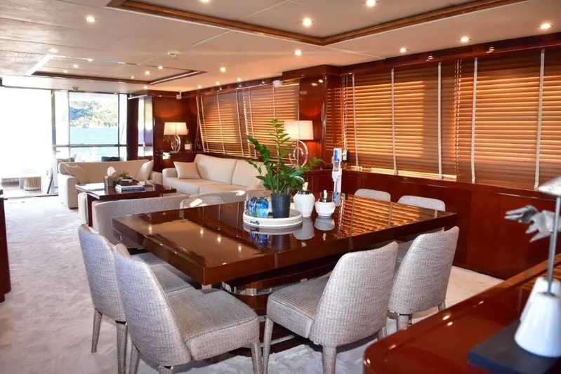  Yacht Photos Pics Luxurious interior of 2008 Falcon 102 HT yacht with elegant dining and living area.
