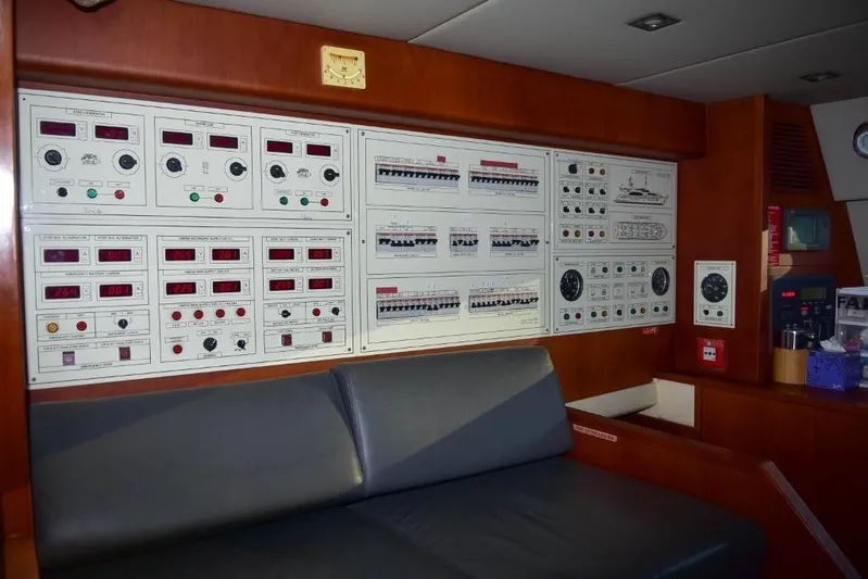  Yacht Photos Pics Control panel room in a 2008 Falcon 102 HT yacht, featuring various gauges and switches.