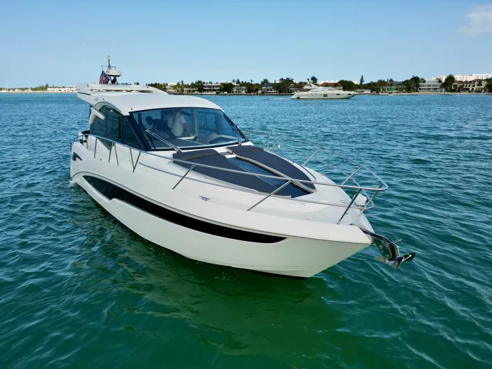  Yacht Photos Pics 2020 Galeon 425 HTS yacht cruising on clear blue water.