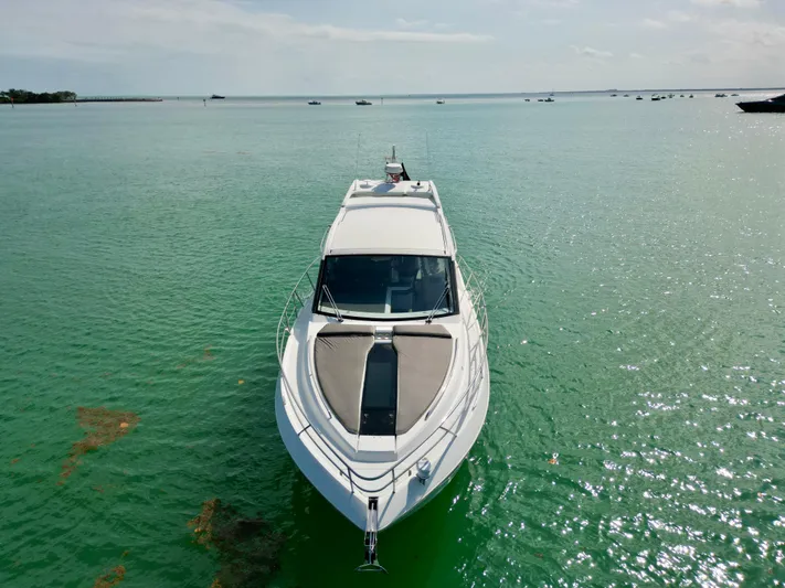  Yacht Photos Pics 2020 Galeon 425 HTS yacht on calm turquoise water, aerial view.