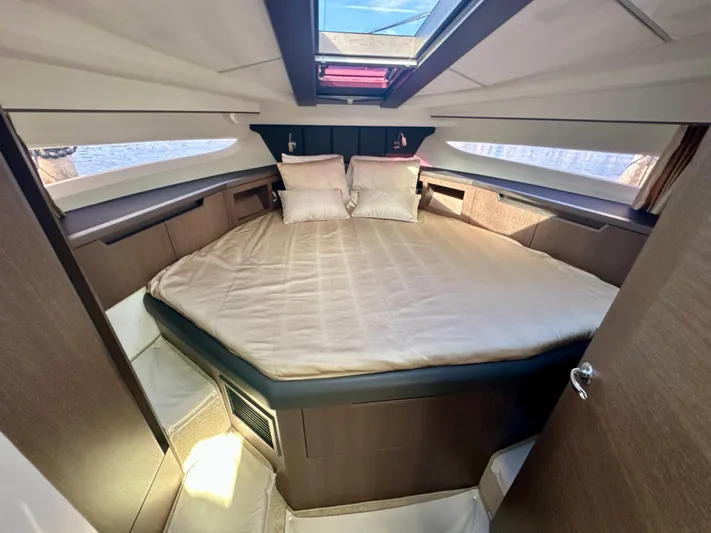  Yacht Photos Pics Luxurious cabin interior of 2020 Galeon 425 HTS yacht with skylight and cozy bedding.