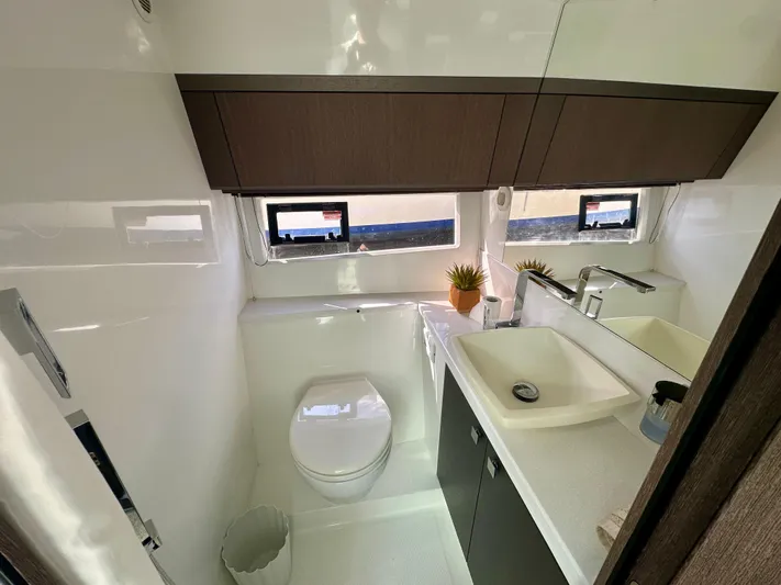 Yacht Photos Pics Modern bathroom interior on 2020 Galeon 425 HTS yacht, featuring sleek fixtures and natural light.