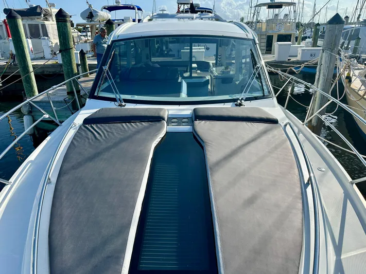  Yacht Photos Pics 2020 Galeon 425 HTS yacht with sleek design, docked at marina.