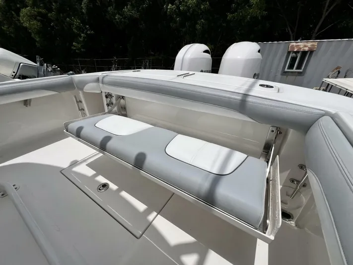 T/t Miss Texas Yacht Photos Pics 2020 Regulator 23 boat with foldable seating and dual outboard motors.