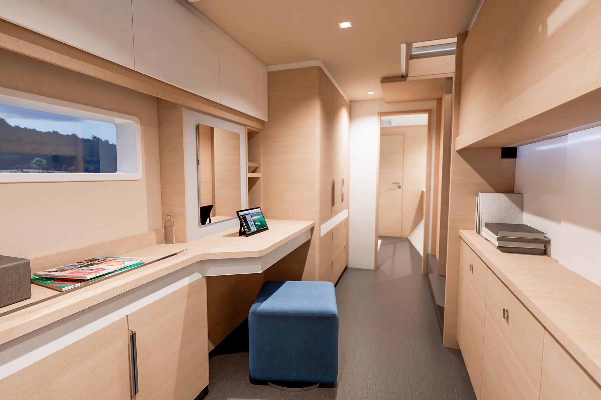 Luxurious interior of 2026 Fountaine Pajot 48 yacht, featuring modern design and ample storage.