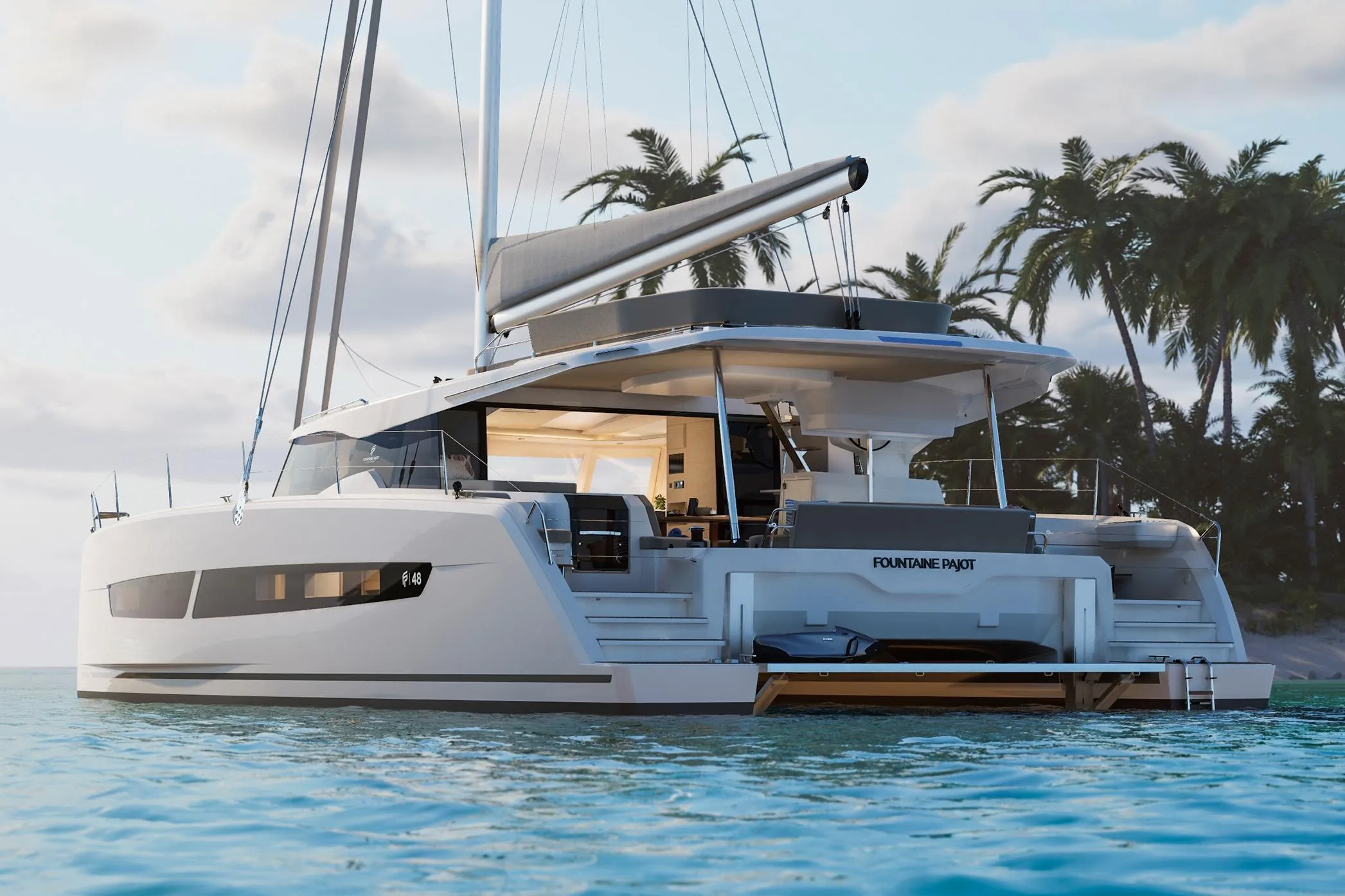 Luxury 2026 Fountaine Pajot 48 catamaran anchored near tropical island with palm trees.